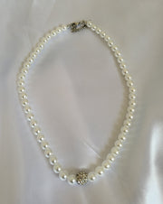 Pearl necklace with pearl earrings and bracelet