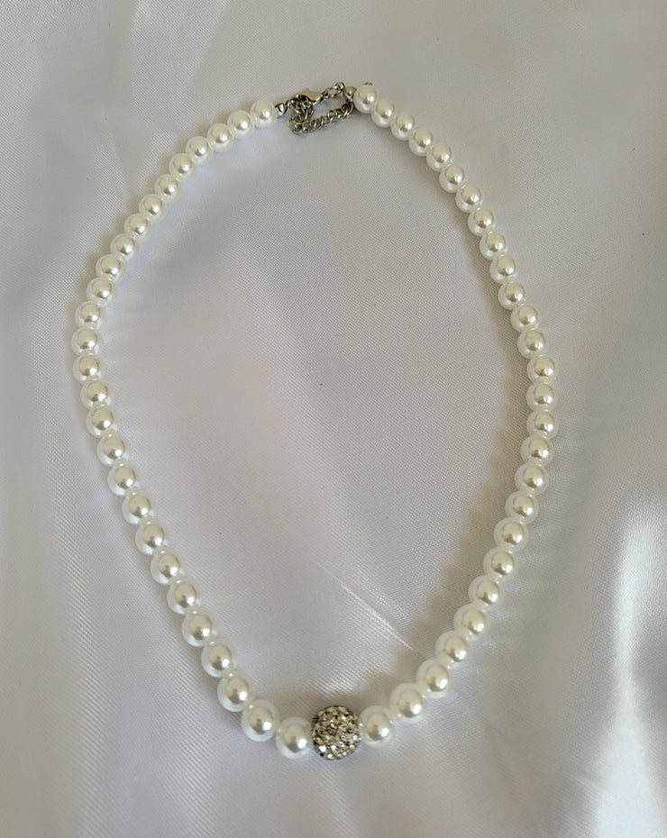 Pearl necklace with pearl earrings and bracelet