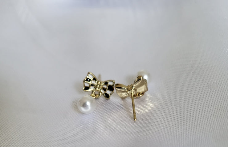 Black and gold bow pearl earrings