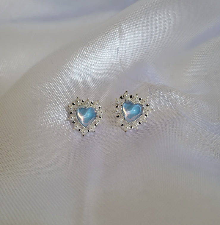Blue heart charm earrings