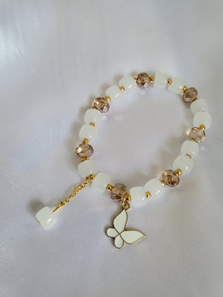 Cream and white butterfly charm bracelet