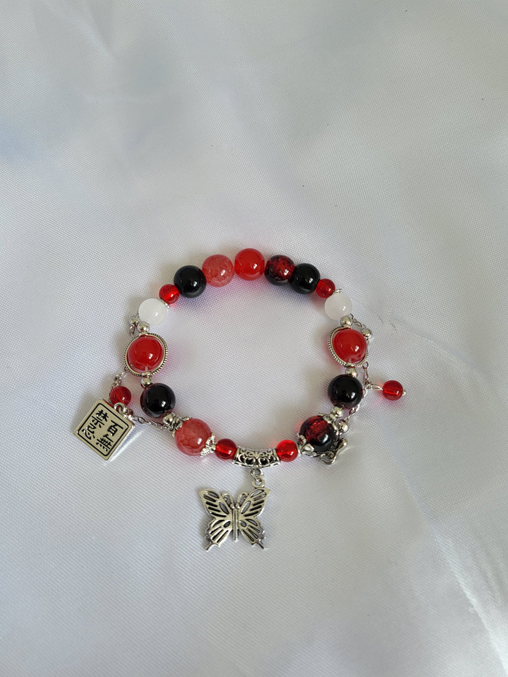 Red butterfly charm bracelet